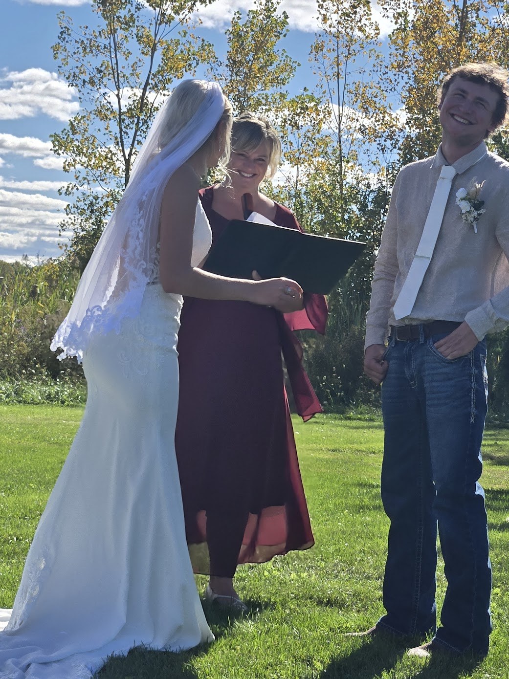 Tammy officiating a joyful outdoor wedding